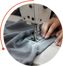 Garment being stitched with a sewing machine